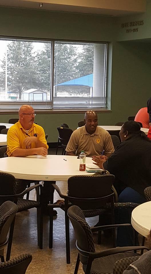 Osceola Police Department Chief Ross Thompson speaking with the youth