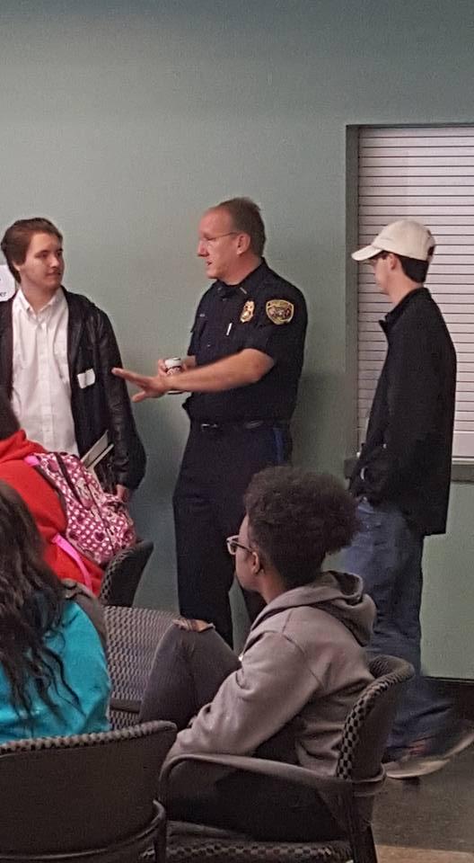 Osceola Police Department Chief Ross Thompson speaking with the youth