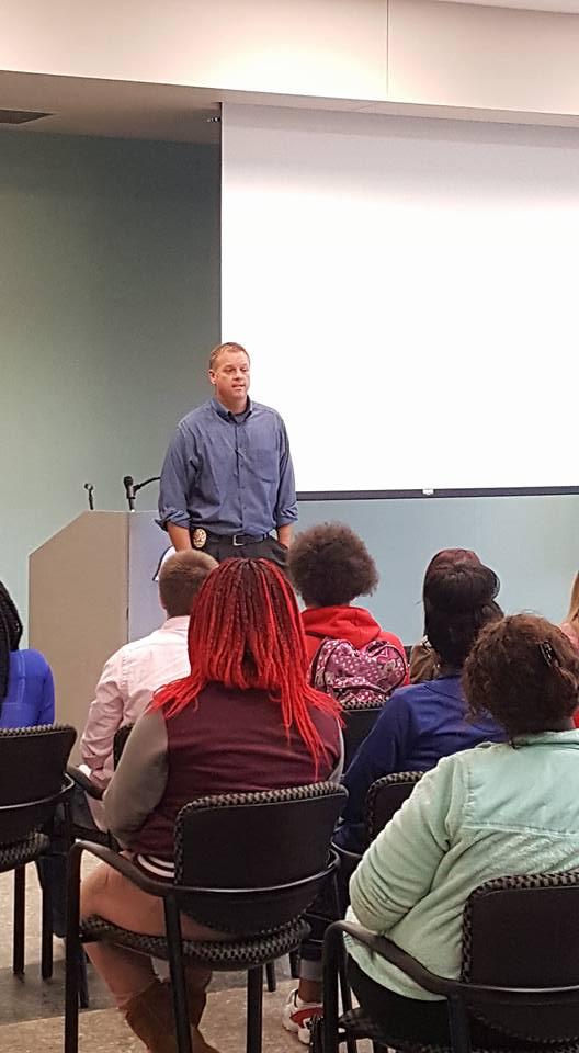 Adult Probation and Parole officer Tim Warhurst speaking to a class of children