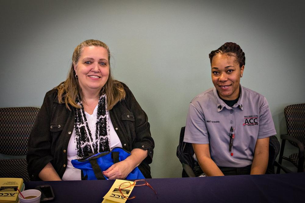 Two females from ACC smiling for the camera